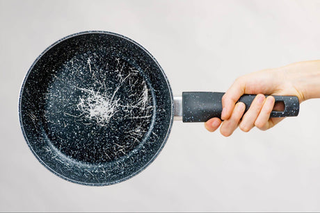 Deep scratches exposing metal on a non-stick frying pan