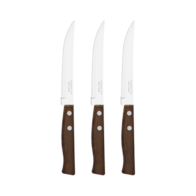 Three stainless steak knives with brown wooden handles and serrated cutting edges