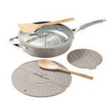 Light grey wok pan set with wooden handles, perforated steamer insert, and lid